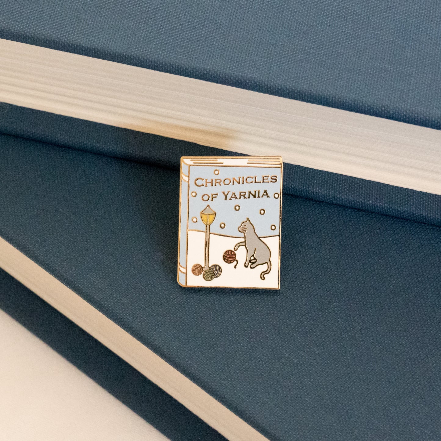 Chronicles of Yarnia Enamel Pin