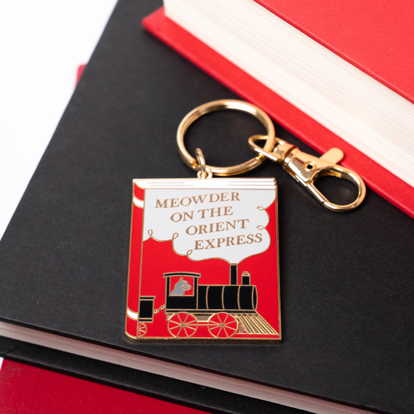 Meowder on the Orient Express Keychain